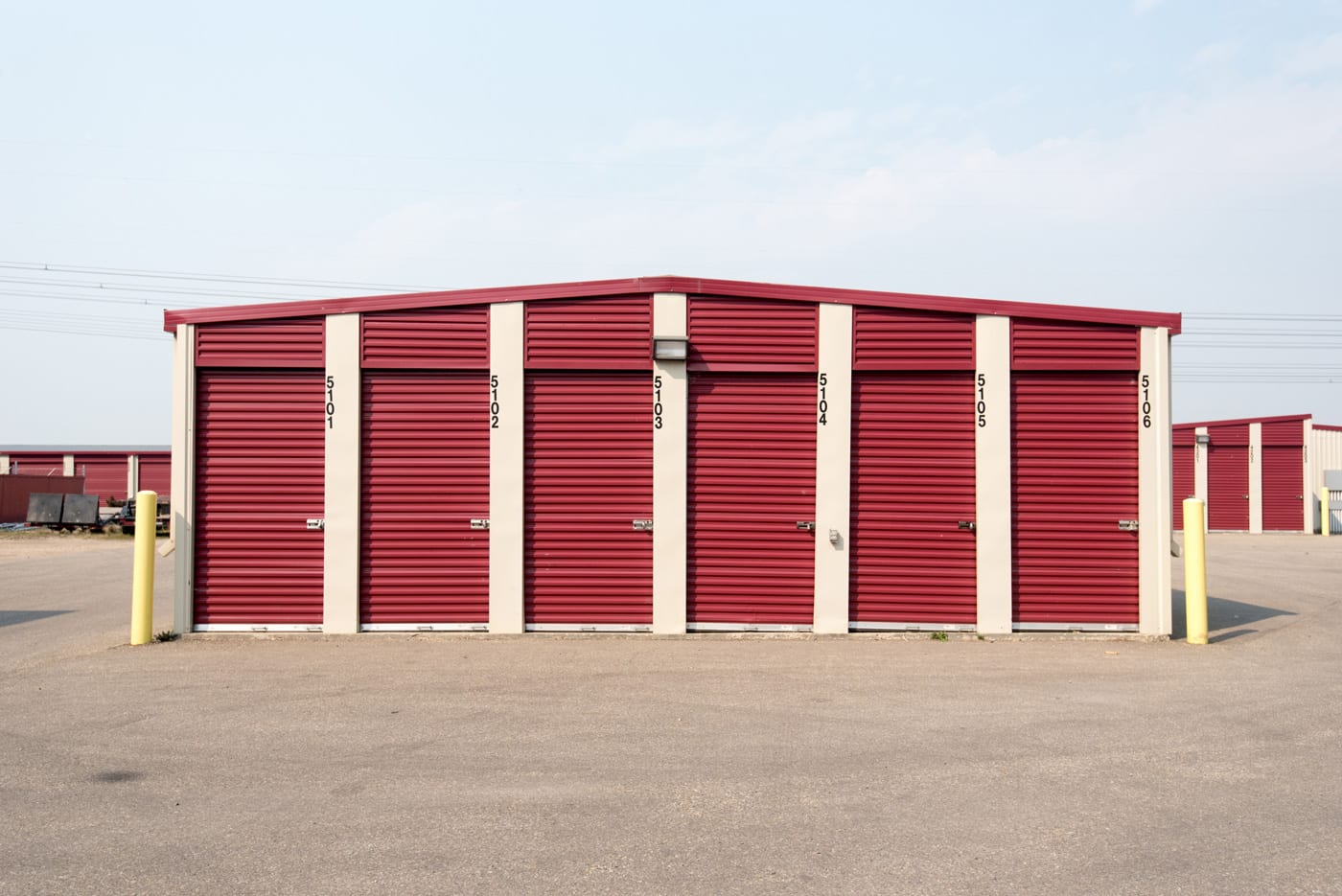 Modern U•STORE•IT Red Deer exterior featuring secure storage buildings with convenient drive-up access.