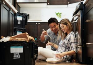 couple packing up their house, couple moving into new house